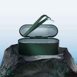 The Optodex Y-Tip contact lens applicator resting next to its disinfecting travel case.